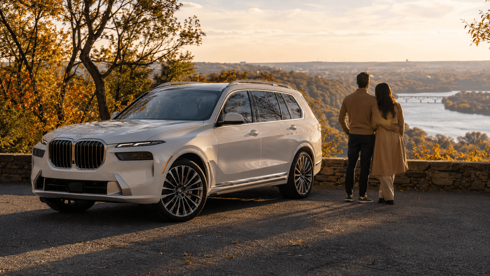 BMW X7 parked along the National Mall with the Washington Monument visible in the background.